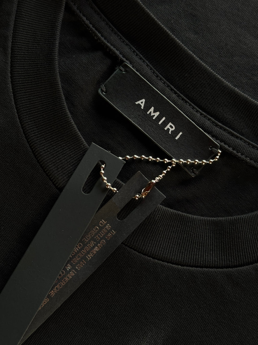 PLAYERA AMIRI