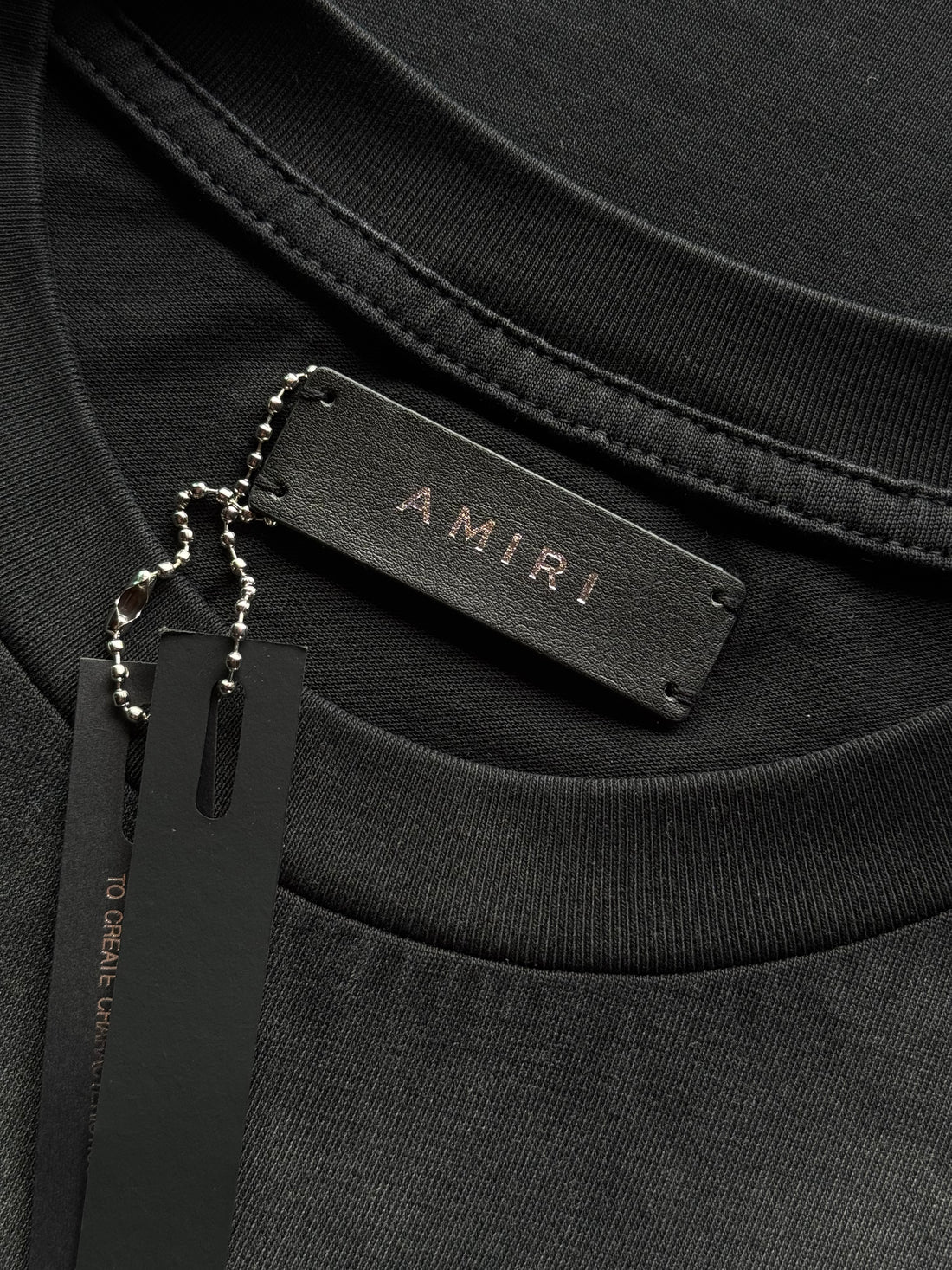 Playera Amiri