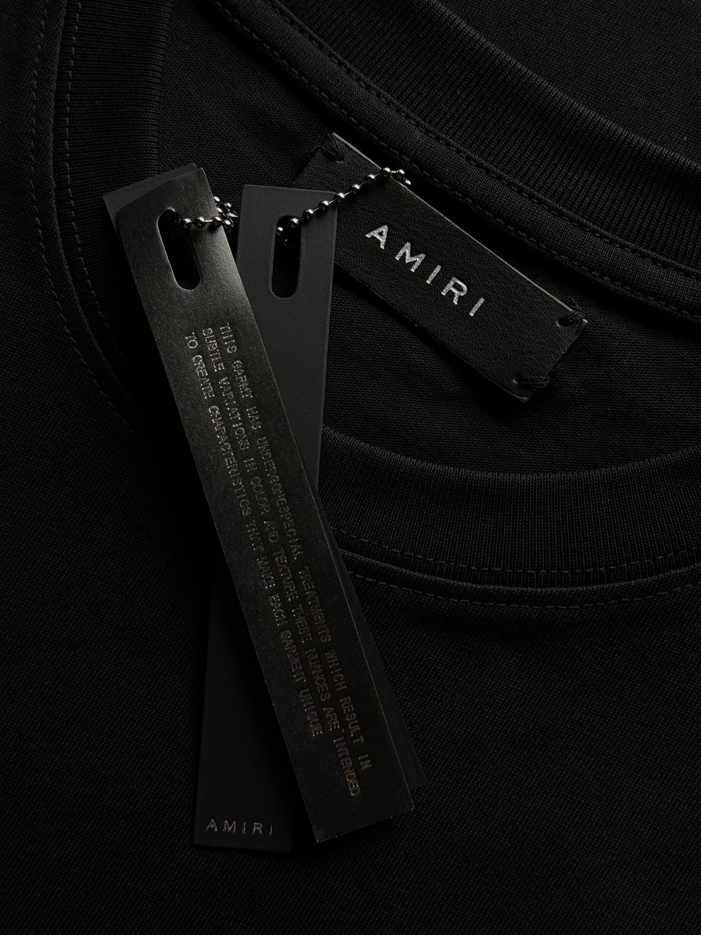 PLAYERA AMIRI