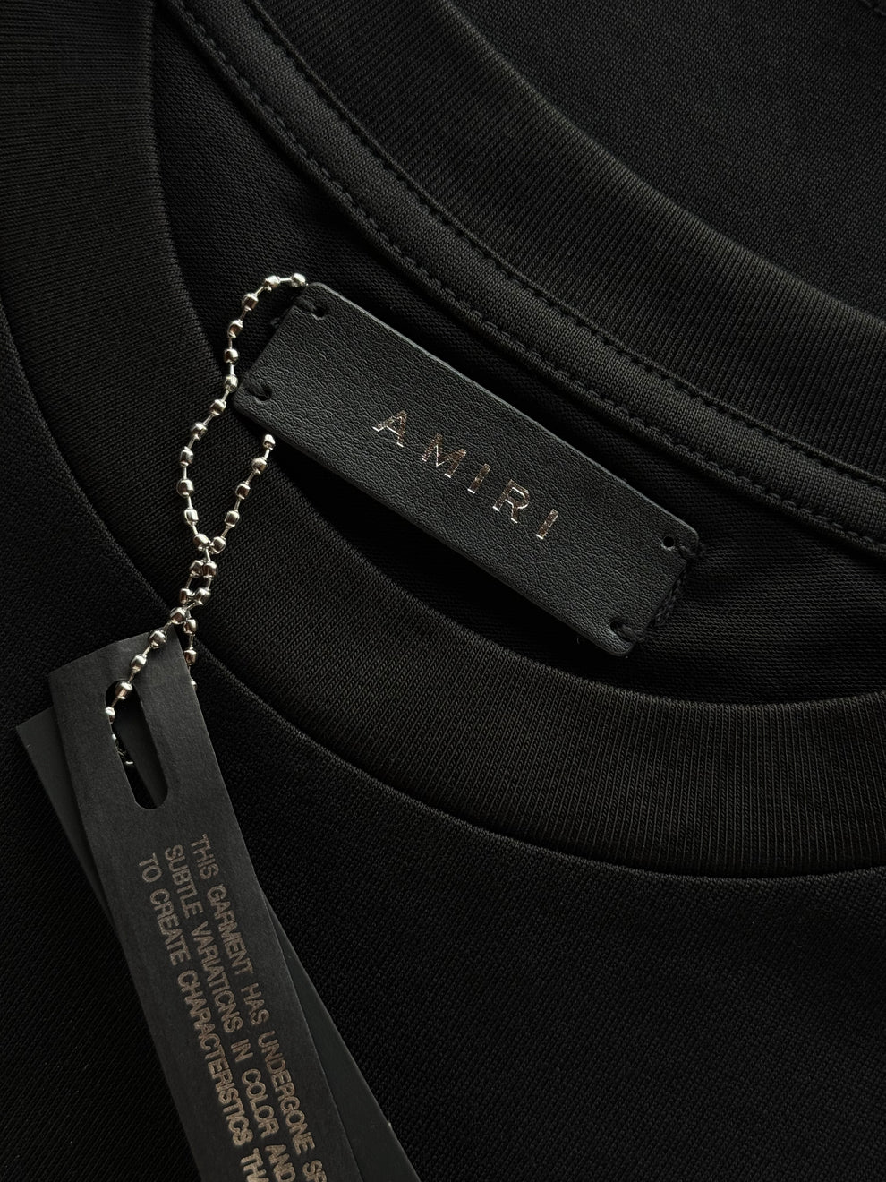 PLAYERA AMIRI