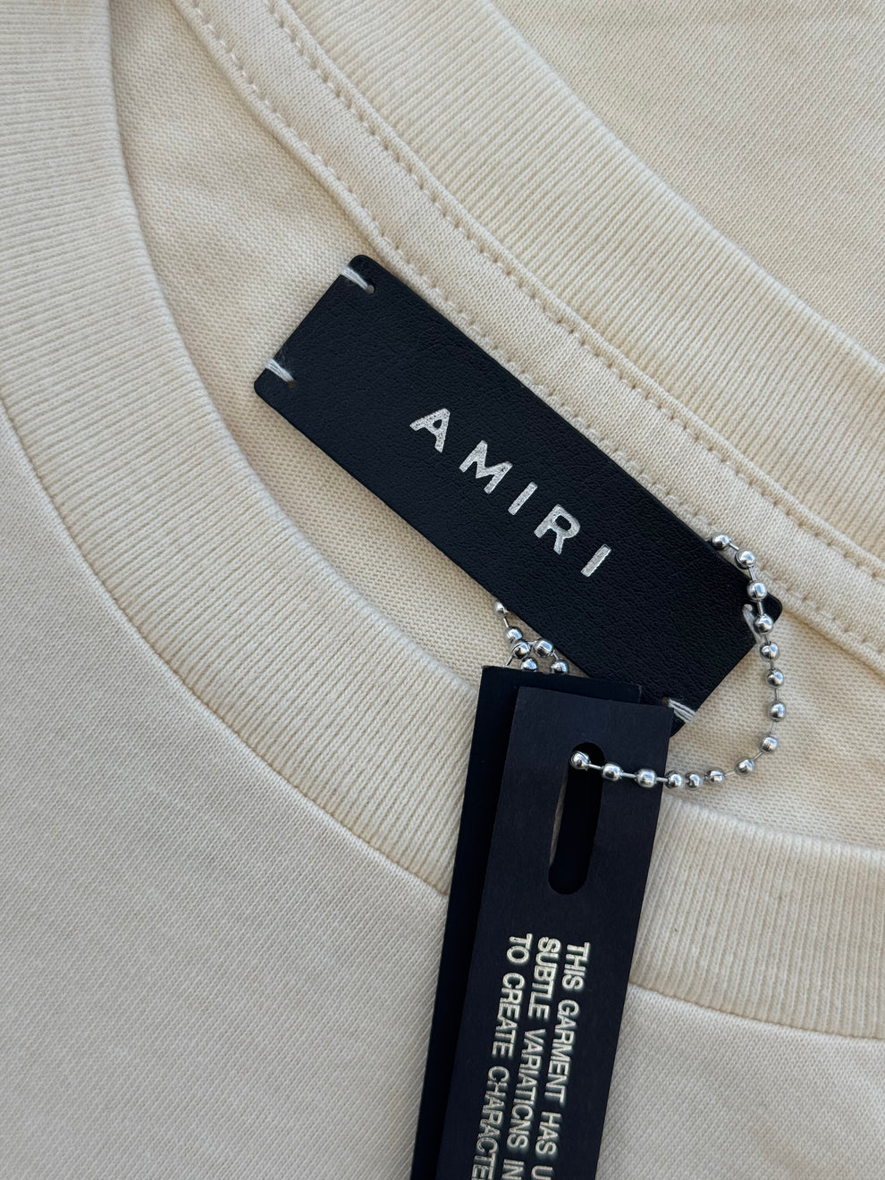 Amiri Color Crema Playera