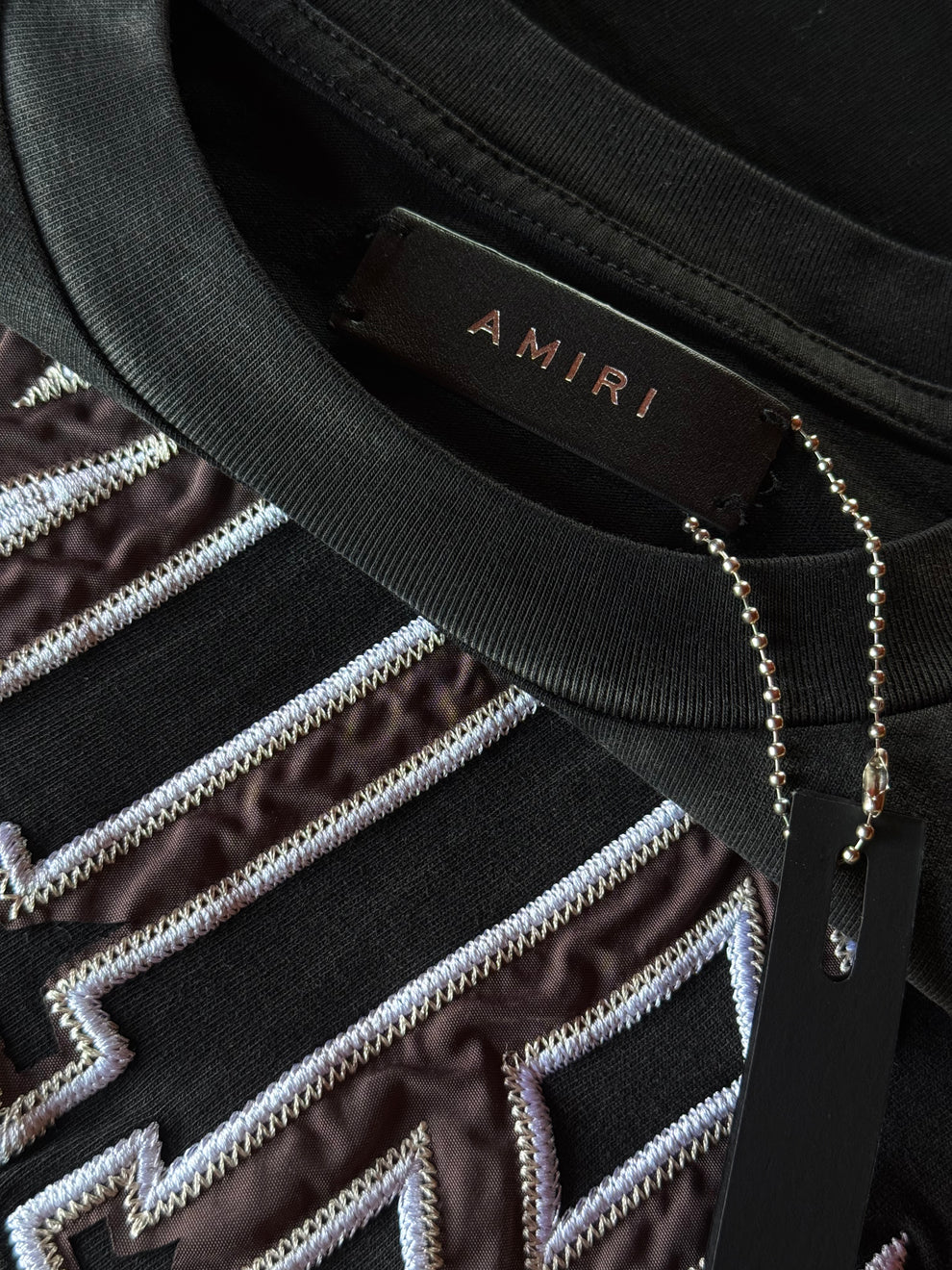 PLAYERA AMIRI